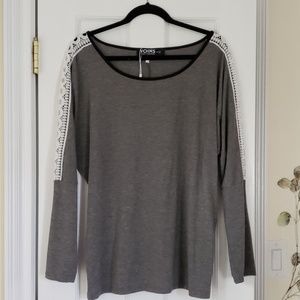 Loose fitting gray long sleeved shirt
